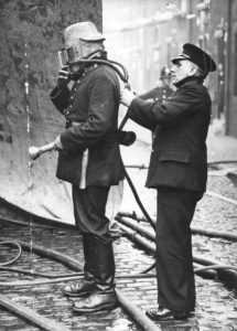 Fireman with smoke helmet