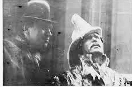 Fire Commissioner Joseph Johnson (left) with icicle-laden Chief John Kenlon.