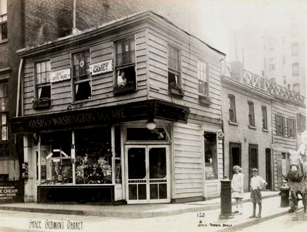 In this photograph by Jessie Tarbox Beals, Grace Godwin looks out the window of her tearoom -- Grace Godwin's Garret -- at 58 Washington Square South. The adjoining buildings at 244 and 246 Thompson Street were reportedly occupied by a roadhouse of ill repute, which was a famous meeting place for celebrities in the sporting world. The buildings also housed a tavern and coffee house for travelers (the stagecoaches would stop there to change horses).  