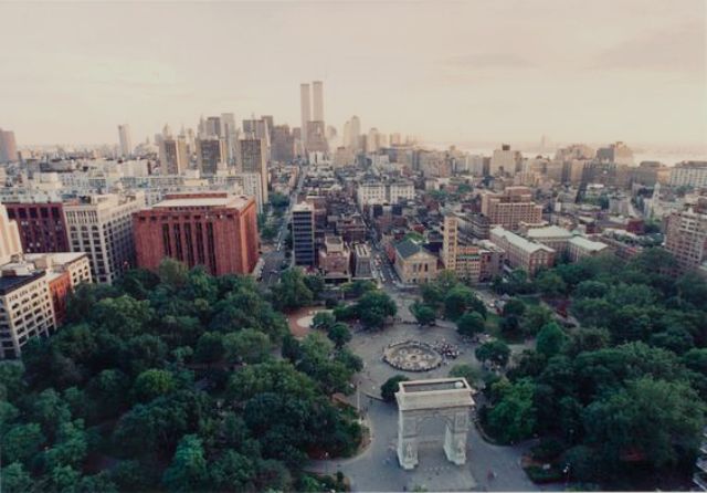 In this aerial view of Washington Square from the 1990s, the Loeb Student Center is to the right of the large red brick building. Note the World Trade Center in the background.