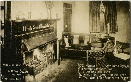Could this be Crazy Cat sitting on the bench seat near the fireplace in the Will o' the Wisp tea room in Sheridan Square? Photo by Jessie Tarbox Beals