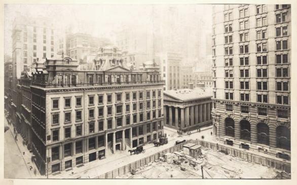 Soon after the Equitable Life fire, the building was razed. This view of the empty lot is looking southeast at the corner of Pine Street and Nassau Street. New York Public Library Collections