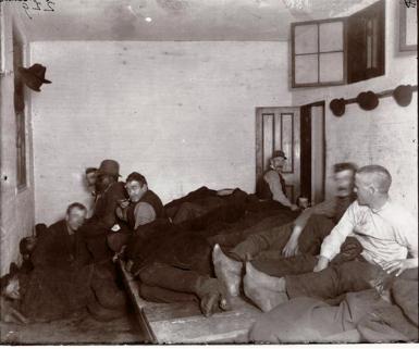 In the late 1800s, the Leonard Street Police Station served as a lodging house for indigents. As photographer Jacob Riis notes, "At the police station the roads of the tramp and the tough again converge." NYPL digital collections