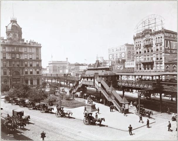 Greeeley Square between Broadway and Sixth Avenue, looking southwest from about 34th Street. When this photo was taken, the Manhattan Theatre and Trainor's restaurant were still standing across from the Sixth Avenue elevated train station. It was here that the Gimbel Brothers department store would be built in 1909.  NYPL digital collections.
