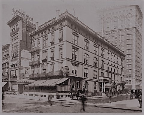 In 1902 when this photo was taken, the Cafe Martin was leasing the building that was home to Delmonico's restaurant from 1876 to 1899. The Town Topics office is to the far left. Museum of the City of New York Collections