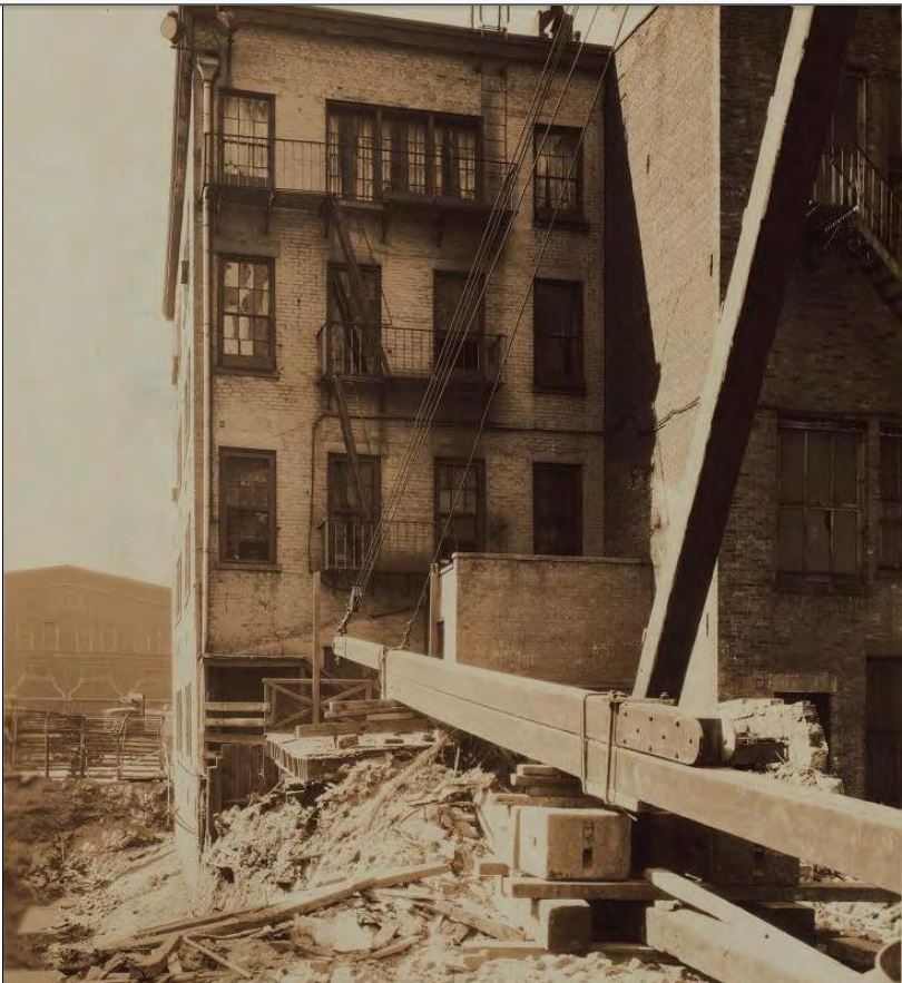 In 1925, the Bowling Green Community Playground adjacent to 45 West Street was demolished to make way for commercial development. This photo from 1925 shows the rear of 45 West Street with new construction in progress. 