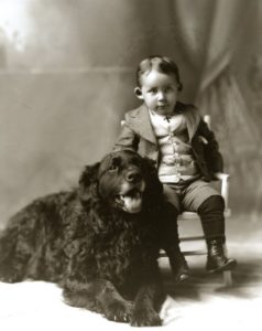Boy with Newfoundland dog, vintage