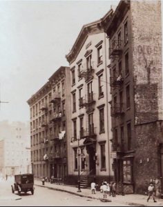 The sound of the explosion was heard at the 4th Precinct police station at 9 Oak Street, pictured here (middle) in 1927. The police station was two blocks from the butcher shop.