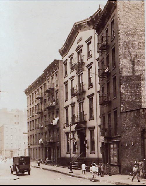 The sound of the explosion was heard at the 4th Precinct police station at 9 Oak Street, pictured here (middle) in 1927. The police station was two blocks from the butcher shop. 