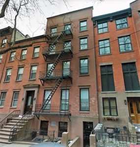 The four-story, nine-unit apartment building at 308 Hicks Street was constructed in 1899. Today, developers have proposed converting the building into a luxury single-family townhouse. 