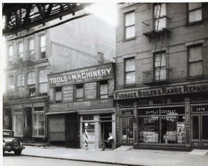 Rowing partners Percy Nagle and Jim Pilkington owned the Golden Oar saloon at 2376 Third Avenue in Harlem (at that time, the building was a long-narrow frame structure). Professional scullers Robert Wallace and George W. Lee took over the business in May 1887, and renamed it The Ship. The men had to abandon ship after only a few months when the business failed to make money. This photo taken in 1932 shows 2376 Third Avenue in 1932 (building on right). Museum of the City of New York Collections