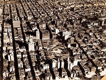 This aerial photograph of Washington Square Park and surrounding streets was taken in 1931, about 25 years before a swath of buildings on the southeast side of the park were razed as part of a slum clearance project headed by Robert Moses. 