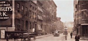 The Jewell Day Nursery was in the three-story building to the right of the Eighth Precinct station house, which is the large building with the American flags. Also pictured is the home of the Second Assembly District Republican Club (#30) and then the former Richmond Hill settlement house, named after the Richmond Hill mansion, which stood in the middle of Charlton Street, between Macdougal and Varick. NYPL Digital Collections