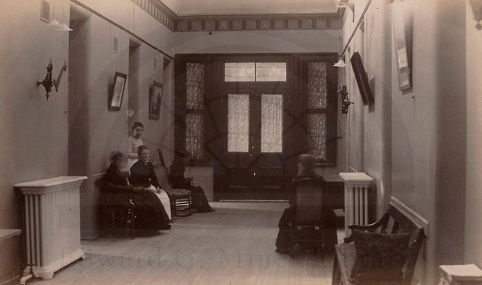 The Insane Pavilion at Bellevue Hospital, located on the 26th Street side of the hospital complex, opened on June 21, 1879. This image was photographed inside the main hall looking toward the front door.