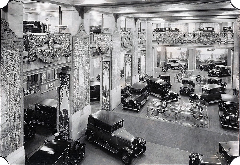 The exhibition areas occupied the first four floors of the Grand Central Palace, with a main exhibition area carved out of the second and third floors to create an interior volume 48 feet high. The main floor could accommodate 94 booths, which were typically about 320 square feet each. Here's a photo of the New York Auto Show in 1927.