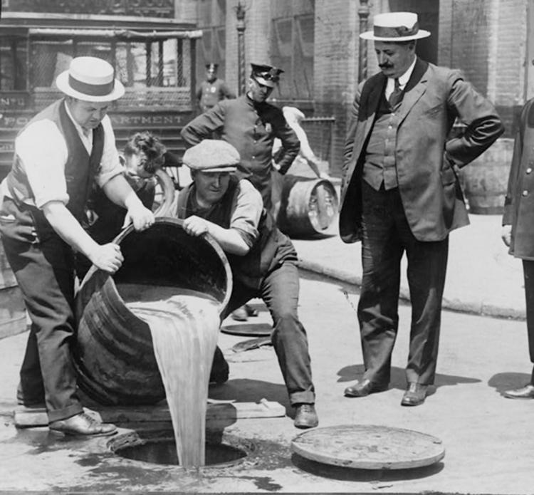 New York City Deputy Police Commissioner John A. Leach (R), ordered the police and other men to pour liquor into the sewers during the height of prohibition.