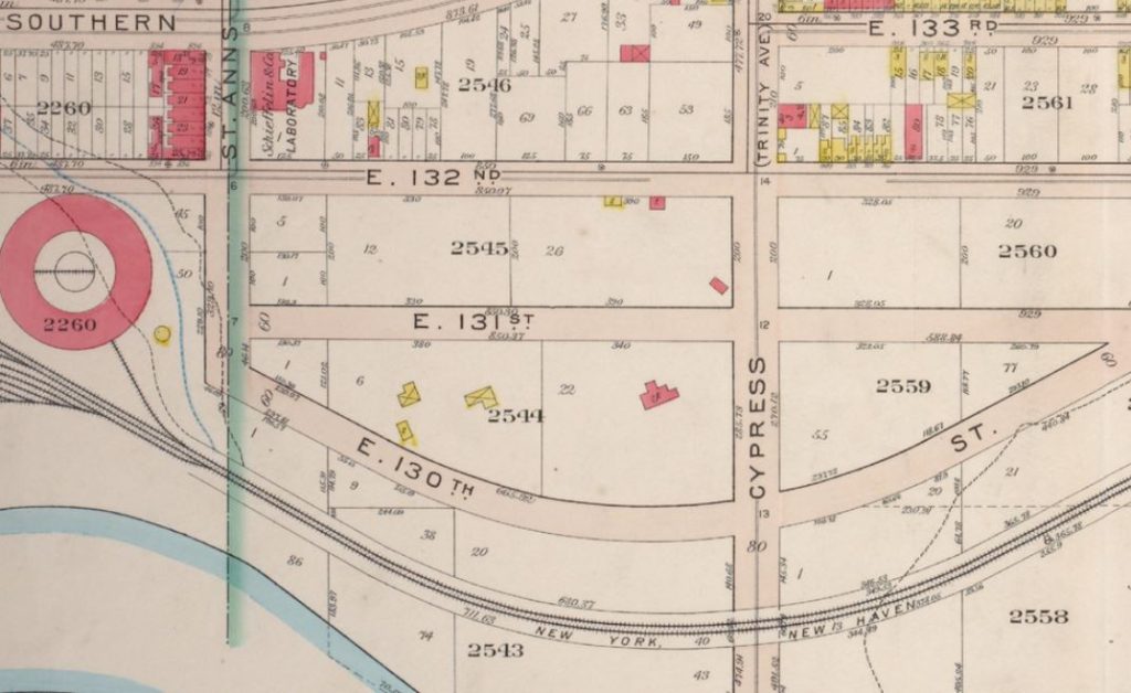 The location of the large Morris mansion (pink building) and the farm buildings and stables (yellow buildings) are noted on this 1885 map. 