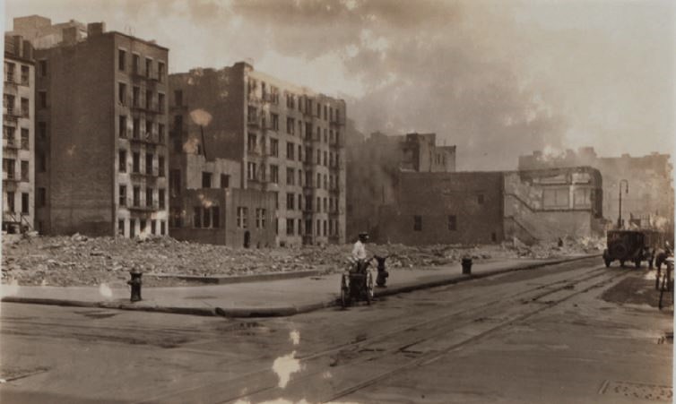 Forsyth Street at the northwest corner of Rivington Street, with the rear of the buildings on the east side of Chrystie Street, during demolition in 1930. New York Public Library Digital Collections. 