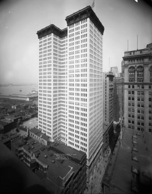 A pneumatic caisson foundation constructed of 3,300 tons of steel and 1.2 million square feet of terracotta blocks lies under the 32-story Adams Express building, constructed in 1912-1914. This photo was taken prior to 1914, when the new American Express Building at 65 Broadway was completed. MCNY Collections
