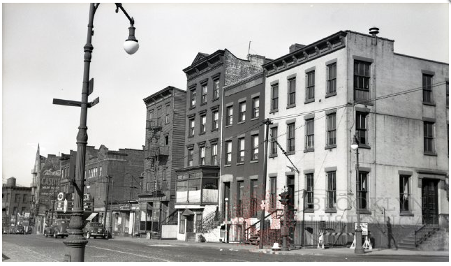 161-179 Washington Street, 1939. The police station for the Brooklyn Bridge Squad was located in the white building, on the corner of Nassau Street. Today, this is Cadman Plaza East. near the fountains in Walt Whitman Park, which opened in 1954. Brooklyn Historical Society