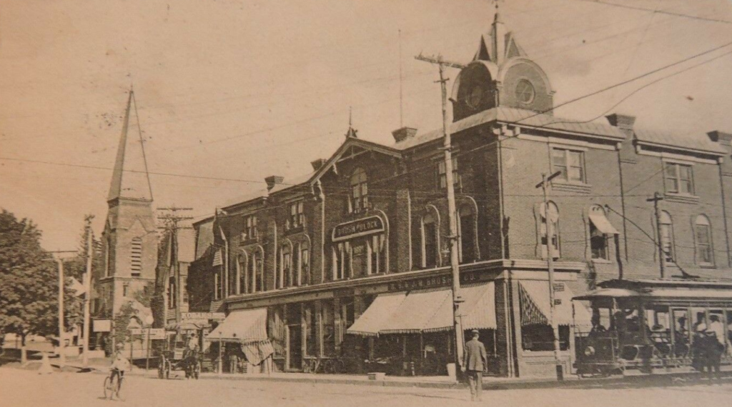The Brush Block, on the South East corner of Main Street and New York Avenue, Huntington, around 1906. 