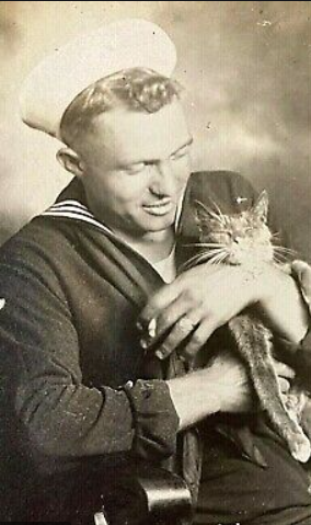 Unidentified sailor with a cat 