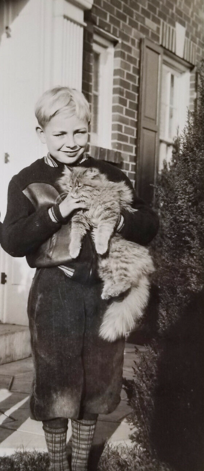 Vintage boy with cat