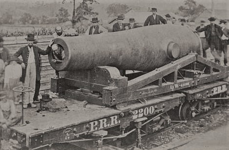 The Rodman gun in transit to Fort Hamilton on a Pennsylvania Railroad flatbed train car, 1864. Library of Congress.