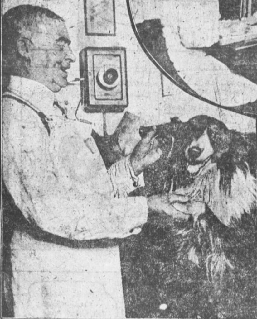 Thomas Grisdale attends to a canine guest, 132 West 65th Street.